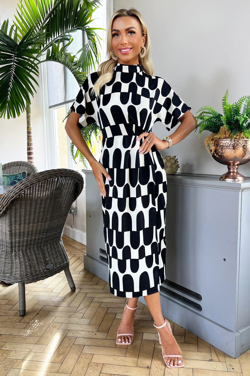 Black and cream midi dress deals